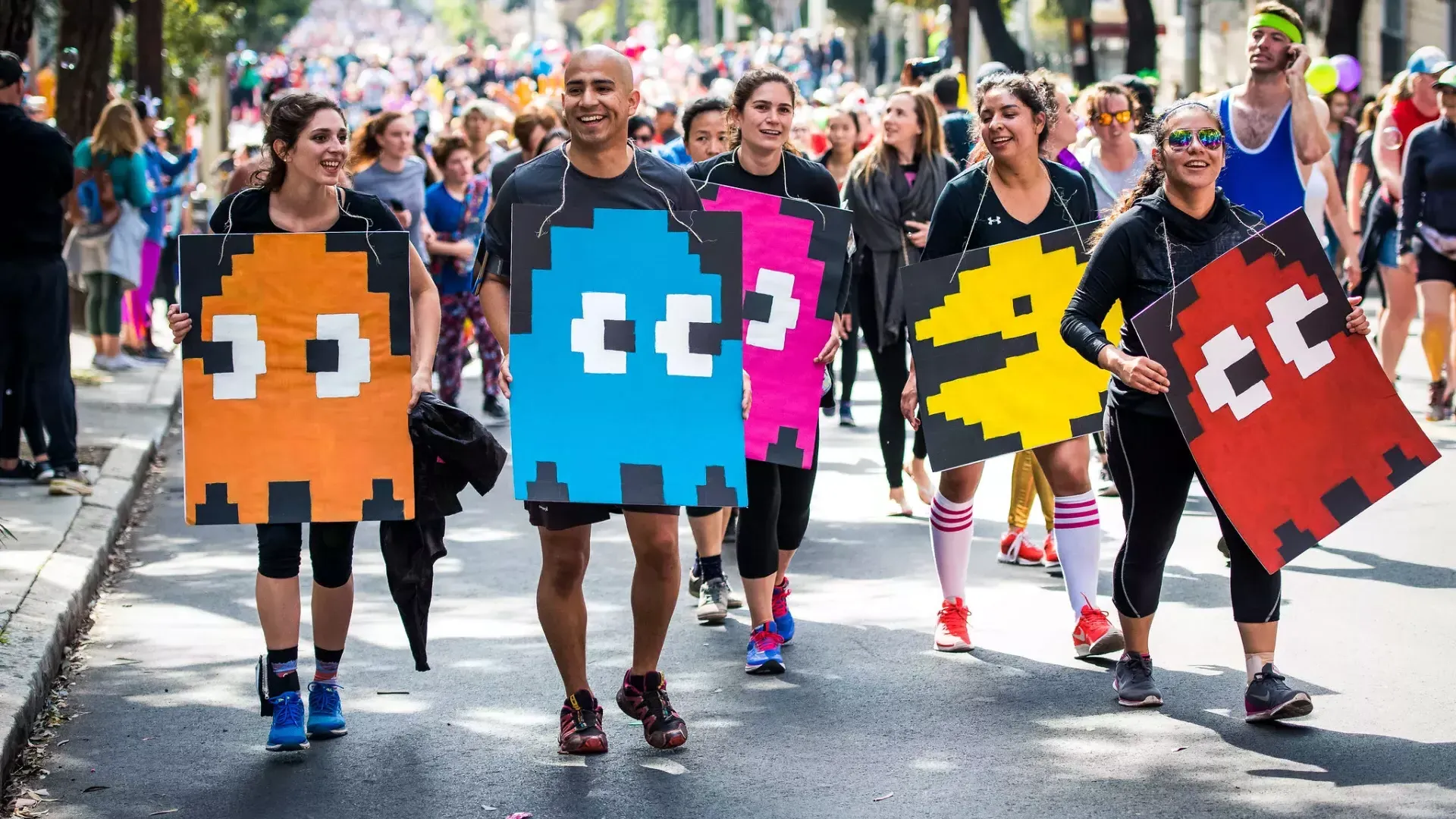 Runners dressed in Pac Man costumes for Bay to Breakers Race SF